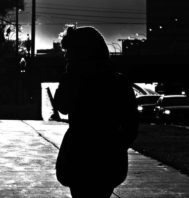 Nice work Megan... I like how your subject is completely silhouetted against the background. A less busy background would help isolate your subject even more.