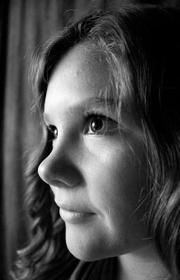 Great shot Rayna... I really like your choice of subject here. The eye is in perfect focus and the soft light from the window compliments your subject.