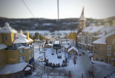 A tilt shift effect was added to this photo as she was coming down a ski lift. A neat shot from an interesting angle.