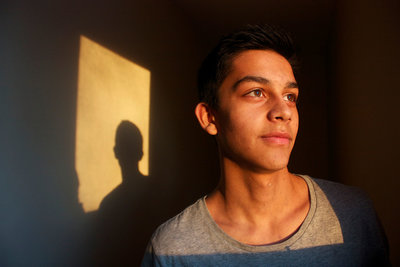 Excellent use of window lighting and the golden hour Laura. I really like how you posed your subject in this photo.